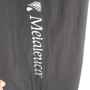 Size 2X Melalueca Logo Pants with wicking lining.